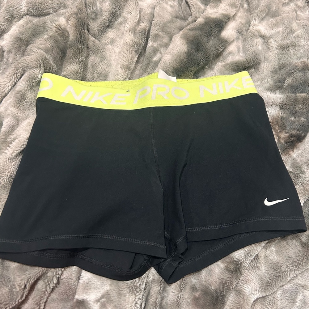 Nike Women's Black and Yellow Pro Shorts